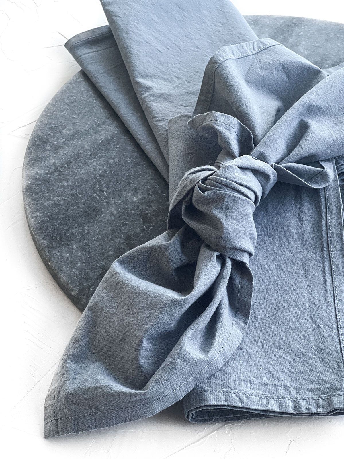 Dusty blue napkins bow decor